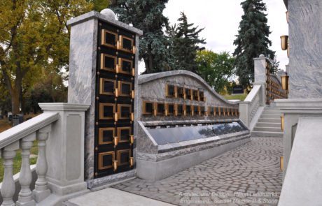 Columbarium designed with Angled bottom row niches and curved roofline