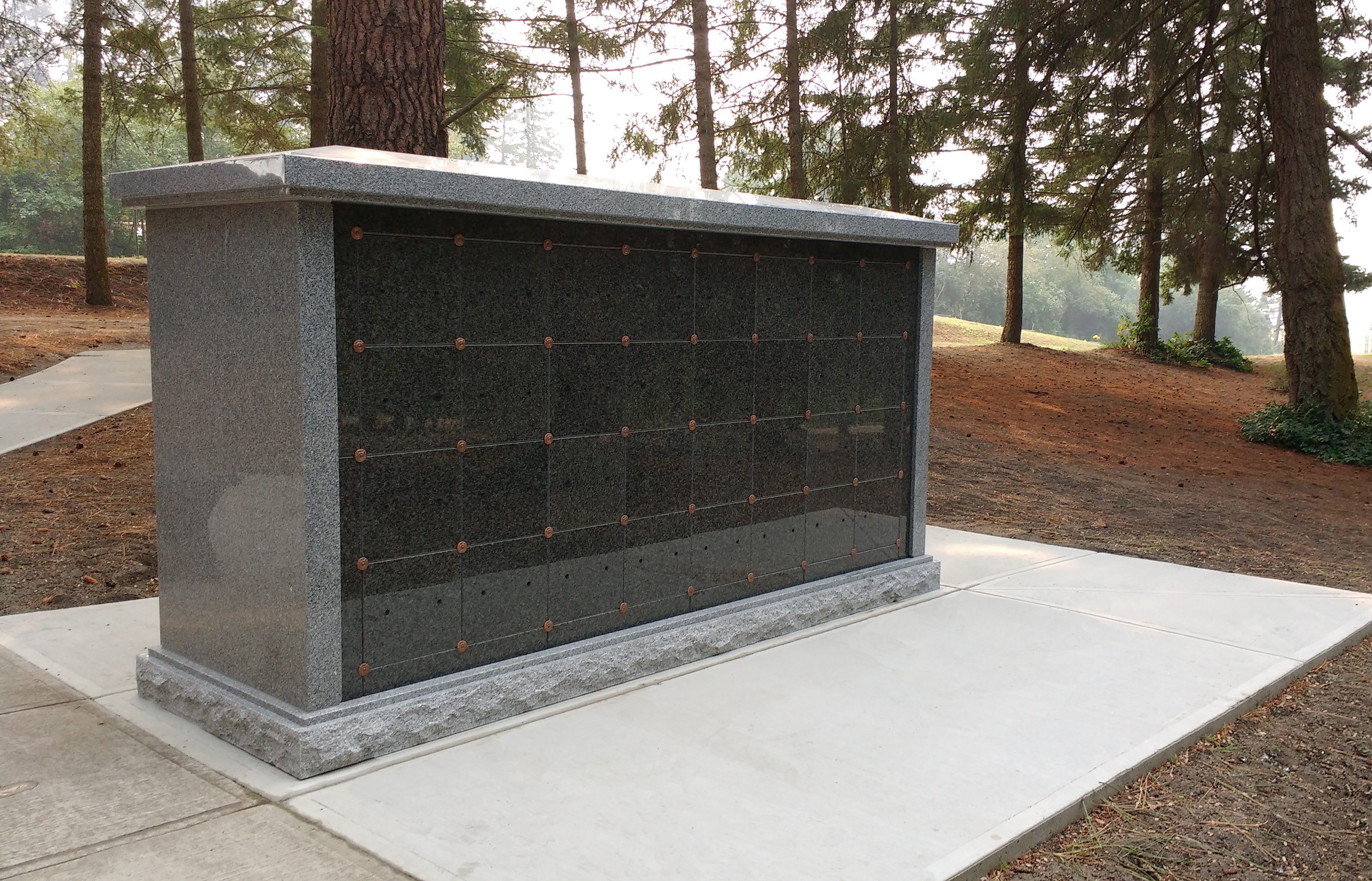 rectangular columbarium with rock pitched base and polished pitched roof